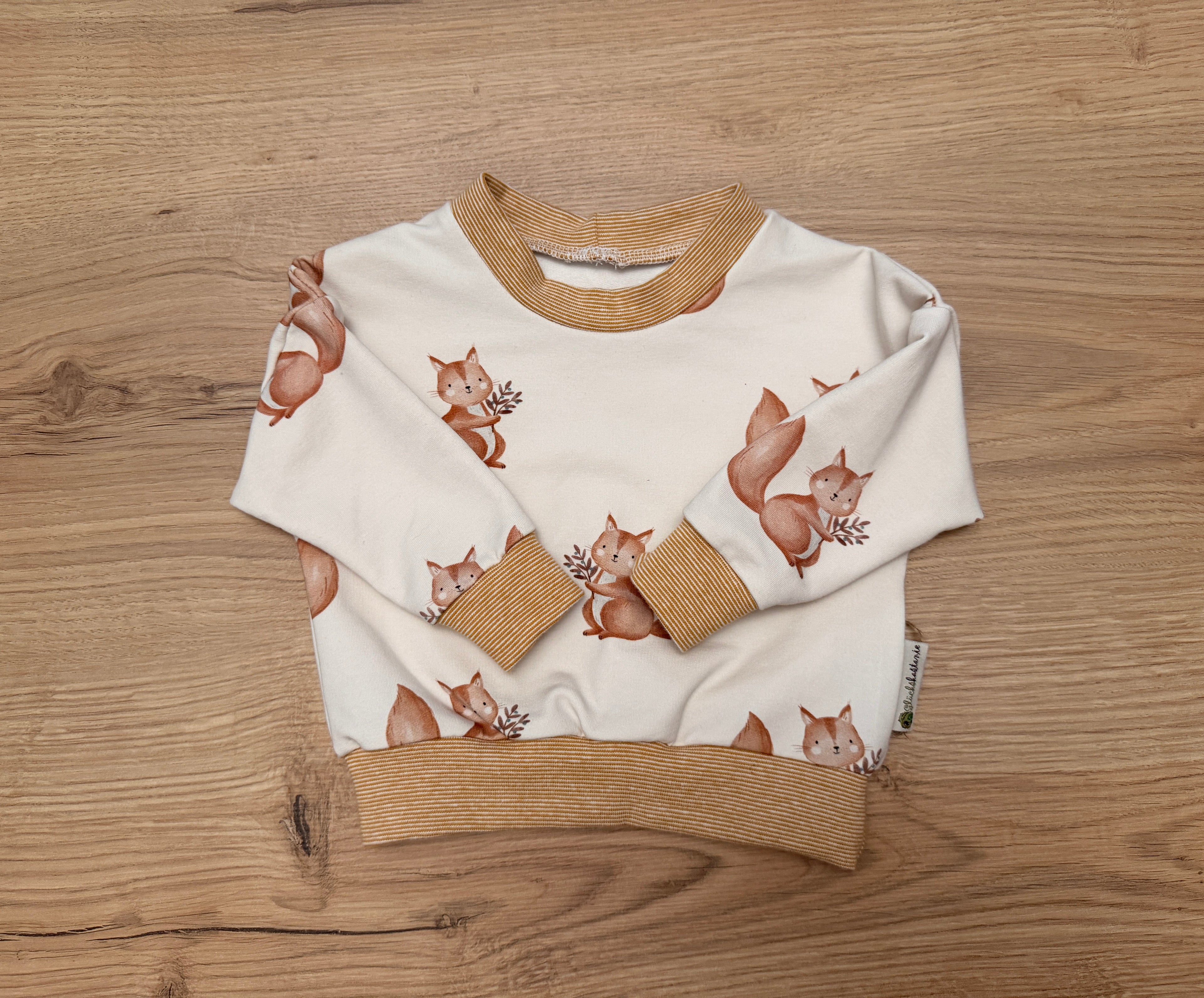 Pullover und Langarmshirts